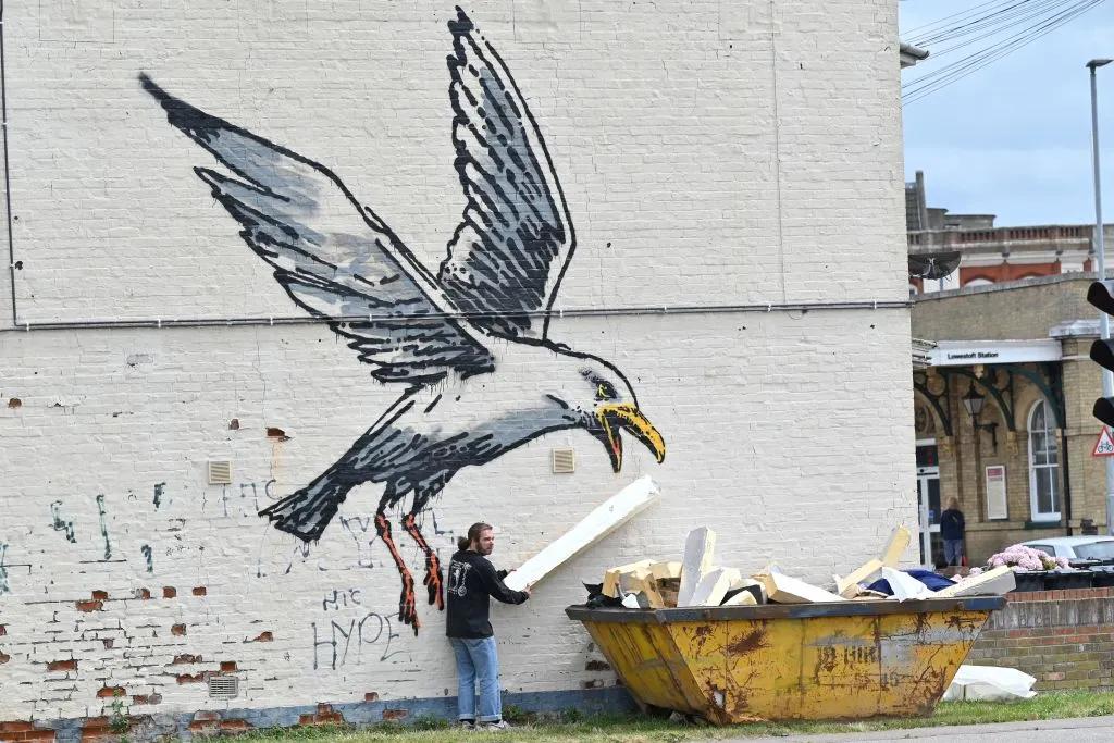 couple_could_face_$250,000_bill_to_remove_banksy_mural_from_their_home